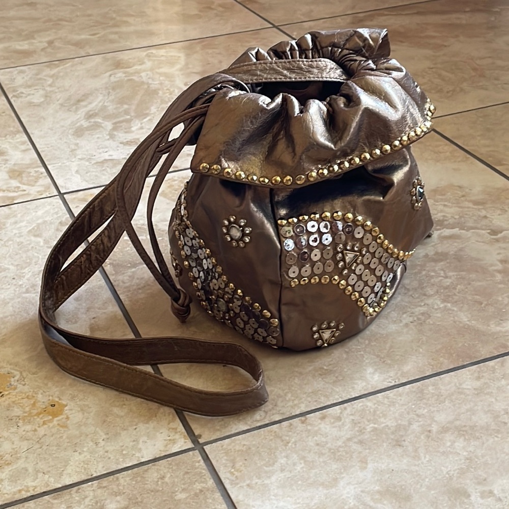 leather double drawstring pouch decorated with studs & rhinestone